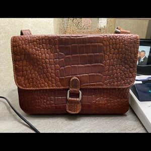 Jack George’s cross body purse.